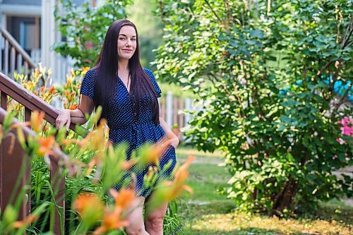 MIKAELA MACKENZIE / WINNIPEG FREE PRESS

Alyson Shane, who volunteered her time helping New Journey Housing staff with their social media and digital marketing strategy, poses for a portrait in her front yard in Winnipeg on Friday, Aug. 6, 2021. For Aaron Epp story.
Winnipeg Free Press 2021.