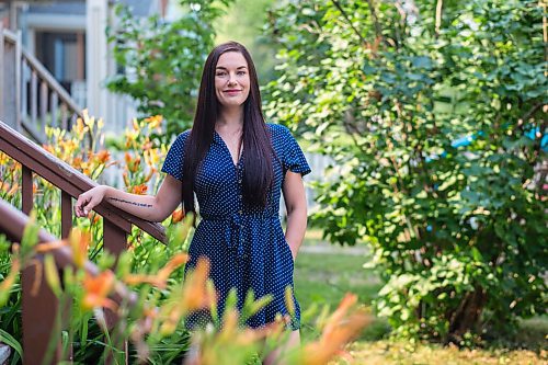 MIKAELA MACKENZIE / WINNIPEG FREE PRESS

Alyson Shane, who volunteered her time helping New Journey Housing staff with their social media and digital marketing strategy, poses for a portrait in her front yard in Winnipeg on Friday, Aug. 6, 2021. For Aaron Epp story.
Winnipeg Free Press 2021.