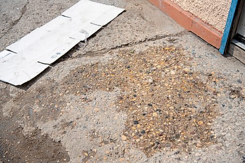 ALEX LUPUL / WINNIPEG FREE PRESS  

Cleaned bloodstains are photographed outside of Maryland Food Store in Winnipeg, where a suspected homicide victim was found.