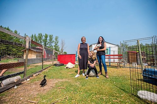 MIKAELA MACKENZIE / WINNIPEG FREE PRESS

Carissa Comeault (left), Macyn Comeault, and Lucy Sloan pose for a portrait at Lil' Steps Wellness Farm in St. Malo on Friday, Aug. 6, 2021. For Sabrina story.
Winnipeg Free Press 2021.