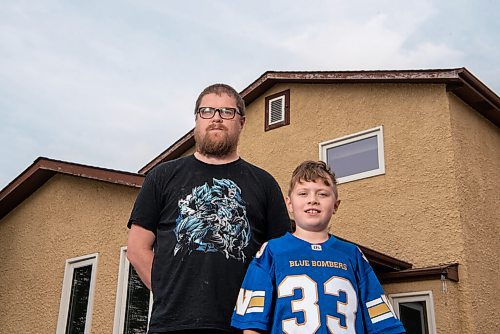 ALEX LUPUL / WINNIPEG FREE PRESS  

Leigh Phillips and his son Keenan are photographed outside of the family's Winnipeg home on Friday, August 6, 2021. Leigh is frustrated with the province's back-to-school plan, which he says completely disregards families with children who cannot be vaccinated or have underlying health conditions.

Reporter: Maggie Macintosh