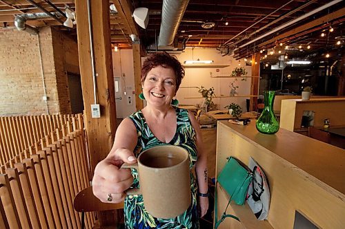MIKE SUDOMA / WINNIPEG FREE PRESS
Genny Sacco-Bak enjoying an americano at Forth Coffee Friday afternoon.
A couple months ago she started a podcast called Coffee With Genny B, during which she visits with owners of Winnipeg coffee shops, roasting houses, etc. 

July 7, 2021
