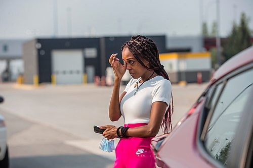 MIKAELA MACKENZIE / WINNIPEG FREE PRESS

Tewedaje Asele speaks to the Free Press after crossing into Canada on the first day the border re-opened to fully vaccinated folks from the United States at Emerson on Monday, Aug. 9, 2021. For Gabby story.
Winnipeg Free Press 2021.