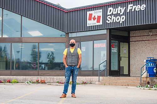 MIKAELA MACKENZIE / WINNIPEG FREE PRESS

Simon Resch, owner of the Duty Free Shop, speaks to the Free Press on the first day the border re-opened to fully vaccinated folks from the United States at Emerson on Monday, Aug. 9, 2021. For Gabby story.
Winnipeg Free Press 2021.