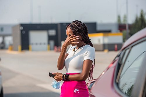 MIKAELA MACKENZIE / WINNIPEG FREE PRESS

Tewedaje Asele speaks to the Free Press after crossing into Canada on the first day the border re-opened to fully vaccinated folks from the United States at Emerson on Monday, Aug. 9, 2021. For Gabby story.
Winnipeg Free Press 2021.