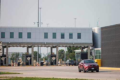 MIKAELA MACKENZIE / WINNIPEG FREE PRESS

Tewedaje Asele drives into Canada on the first day the border re-opened to fully vaccinated folks from the United States at Emerson on Monday, Aug. 9, 2021. For Gabby story.
Winnipeg Free Press 2021.