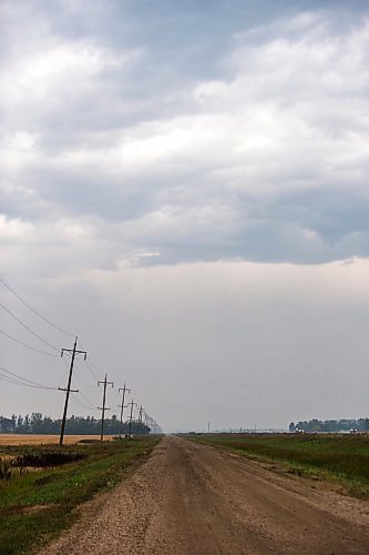 MIKAELA MACKENZIE / WINNIPEG FREE PRESS

Thunderclouds, a rare sight in this unusually dry summer, grace the sky above fields south of Winnipeg on Monday, Aug. 9, 2021. Standup.
Winnipeg Free Press 2021.