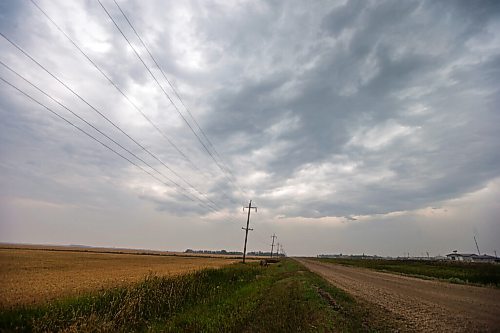 MIKAELA MACKENZIE / WINNIPEG FREE PRESS

Thunderclouds, a rare sight in this unusually dry summer, grace the sky above fields south of Winnipeg on Monday, Aug. 9, 2021. Standup.
Winnipeg Free Press 2021.