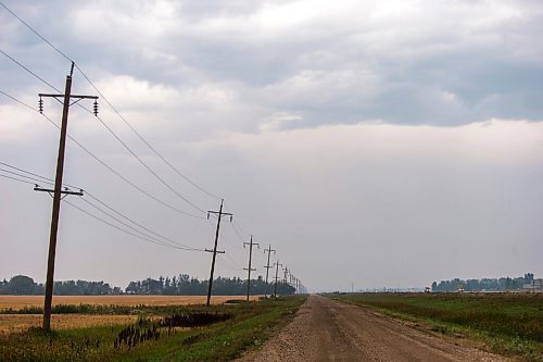 MIKAELA MACKENZIE / WINNIPEG FREE PRESS

Thunderclouds, a rare sight in this unusually dry summer, grace the sky above fields south of Winnipeg on Monday, Aug. 9, 2021. Standup.
Winnipeg Free Press 2021.