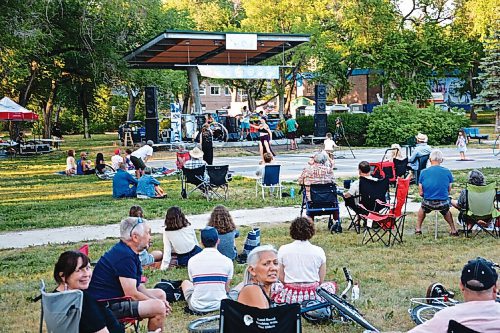 Canstar Community News Attendees enjoy the entertainment at St-Bonifest in Coronation Park on July 20.