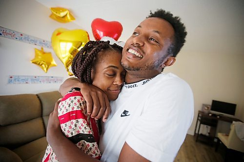 JOHN WOODS / WINNIPEG FREE PRESS
Tewedaje Asele and her husband Lidetu are happy to see each other in their new apartment in Winnipeg Monday, August 9, 2021. The couple hasnt seen each other for seventeen months because of COVID-19 restrictions and Tewedaje lived in the United States. She drove from Minnesota this morning to join her husband in Winnipeg after Canada opened its border to the US.

