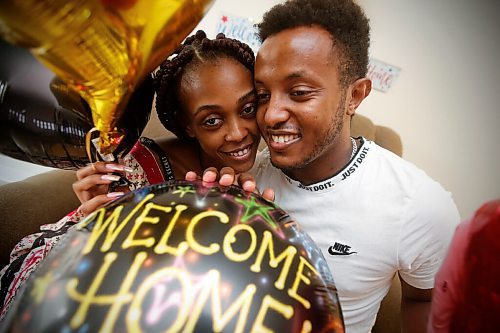 JOHN WOODS / WINNIPEG FREE PRESS
Tewedaje Asele and her husband Lidetu are happy to see each other in their new apartment in Winnipeg Monday, August 9, 2021. The couple hasnt seen each other for seventeen months because of COVID-19 restrictions and Tewedaje lived in the United States. She drove from Minnesota this morning to join her husband in Winnipeg after Canada opened its border to the US.

