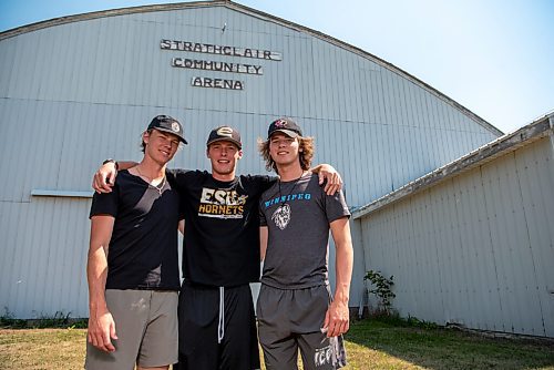 ALEX LUPUL / WINNIPEG FREE PRESS  

From left, Morgan, Noah and Conor Geekie are photographed outside of Strathclair Community Arena on Sunday, August 8, 2021.

