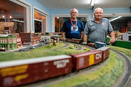 ALEX LUPUL / WINNIPEG FREE PRESS  

From left, Gary Stempnick and Gord Leathers pose for a portrait next to Winnipeg Model Railroad Club train layouts at the Winnipeg Railway Museum on Monday, August 9, 2021.