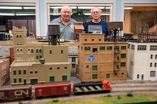 ALEX LUPUL / WINNIPEG FREE PRESS  

From left, Gary Stempnick and Gord Leathers pose for a portrait next to Winnipeg Model Railroad Club train layouts at the Winnipeg Railway Museum on Monday, August 9, 2021.