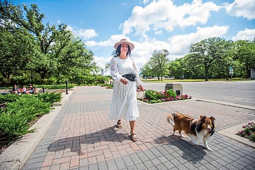 MIKAELA MACKENZIE / WINNIPEG FREE PRESS

Jamie Barber, owner and head trainer of Candor Canine, poses for a portrait with her dog, Indy, at Assiniboine Park in Winnipeg on Tuesday, Aug. 10, 2021. Candor Canine recently started offering a doggie wedding date service, where Jamie (or one of her staffers) will take care of a couples' pooch for the event. For Eva Wasney story.
Winnipeg Free Press 2021.