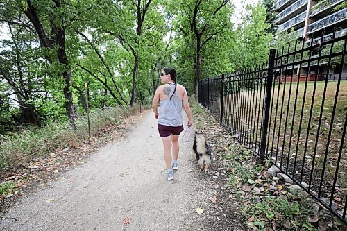 RUTH BONNEVILLE / WINNIPEG FREE PRESS

LOCAL -  River trail safety 

Elizabeth Bathie walks her dog Phoebe along the Red river on a trail that runs behind Osborne Street on Tuesday.  She was asked by a FP reporter on how she felt about the incidents of assaults that have taken place along the trail in recent weeks.  

See story. 

Aug 10th, 2021
