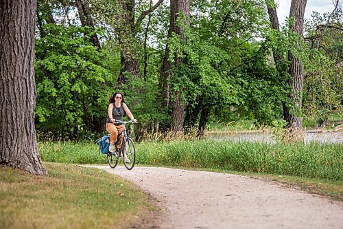 MIKAELA MACKENZIE / WINNIPEG FREE PRESS

Mel Marginet, cyclist and jogger who uses the path regularly, poses for a portrait on the river trail along Churchill Drive in Winnipeg on Tuesday, Aug. 10, 2021. For Erik story.
Winnipeg Free Press 2021.