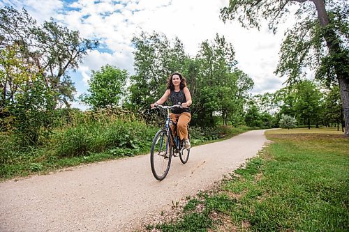 MIKAELA MACKENZIE / WINNIPEG FREE PRESS

Mel Marginet, cyclist and jogger who uses the path regularly, poses for a portrait on the river trail along Churchill Drive in Winnipeg on Tuesday, Aug. 10, 2021. For Erik story.
Winnipeg Free Press 2021.