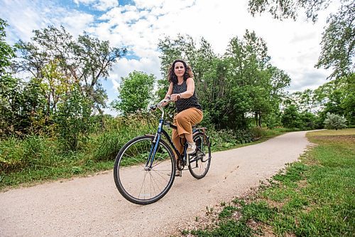 MIKAELA MACKENZIE / WINNIPEG FREE PRESS

Mel Marginet, cyclist and jogger who uses the path regularly, poses for a portrait on the river trail along Churchill Drive in Winnipeg on Tuesday, Aug. 10, 2021. For Erik story.
Winnipeg Free Press 2021.