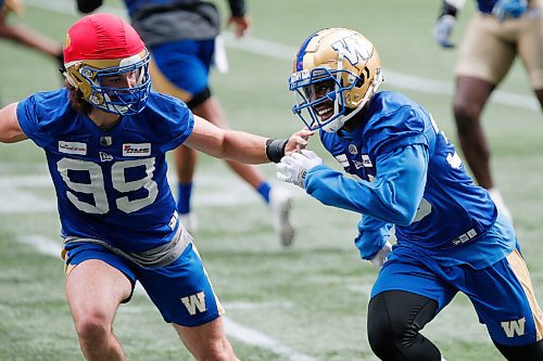 JOHN WOODS / WINNIPEG FREE PRESS
Winnipeg Blue Bombers Jontrell Rocquemore (36) tries to get past Nick Dheilly (99) at practice in Winnipeg Tuesday, August 10, 2021. 
