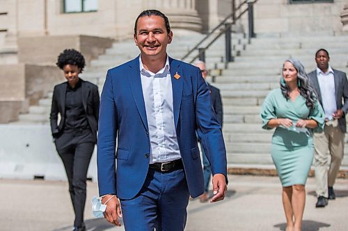 MIKAELA MACKENZIE / WINNIPEG FREE PRESS

Wab Kinew and other NDP MLAs walk out to speak to the media behind the Manitoba Legislative Building in Winnipeg on Wednesday, Aug. 11, 2021. For Joyanne/Maggie story.
Winnipeg Free Press 2021.