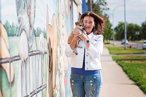 MIKAELA MACKENZIE / WINNIPEG FREE PRESS

Carla Martinelli-Irvine poses for a portrait at Winnipeg Pet Rescue Shelter in Winnipeg on Wednesday, Aug. 11, 2021. She supports the city's proposed changes to its responsible pet ownership bylaw. For Gabby story.
Winnipeg Free Press 2021.