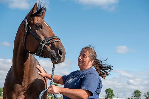 ALEX LUPUL / WINNIPEG FREE PRESS  

Trainer Lise Pruitt is photographed with racehorse Hidden Grace at Assiniboia Downs in Winnipeg on Thursday, August 12, 2021.

Reporter: George Williams