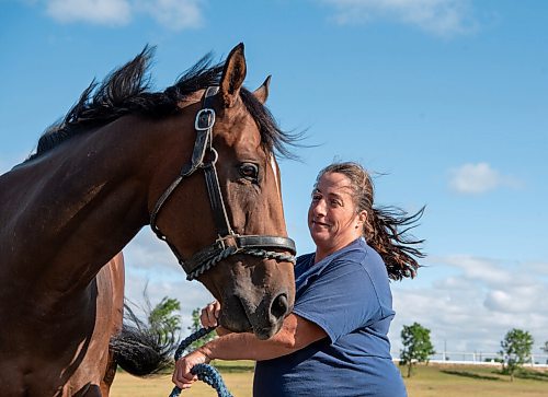ALEX LUPUL / WINNIPEG FREE PRESS  

Trainer Lise Pruitt is photographed with racehorse Hidden Grace at Assiniboia Downs in Winnipeg on Thursday, August 12, 2021.

Reporter: George Williams