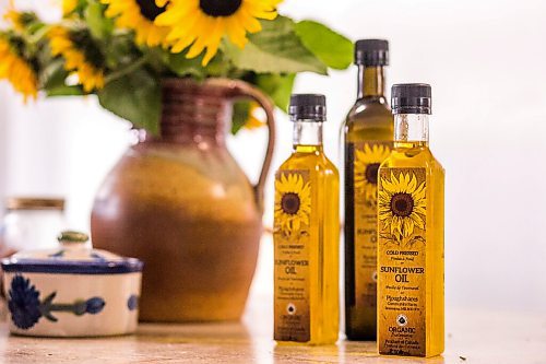 MIKAELA MACKENZIE / WINNIPEG FREE PRESS

Some of the finished bottled sunflower oil at Ploughshares Community Farm near Beausejour on Thursday, Aug. 12, 2021. For Jen story.
Winnipeg Free Press 2021.