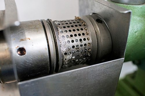 MIKAELA MACKENZIE / WINNIPEG FREE PRESS

Sunflower oil slowly drips out of the press at Ploughshares Community Farm near Beausejour on Thursday, Aug. 12, 2021. For Jen story.
Winnipeg Free Press 2021.