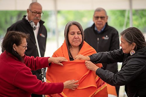 ALEX LUPUL / WINNIPEG FREE PRESS  

Stephanie Scott, Executive Director at NCTR, is photographed wrapped in a shawl during a blessing at the future home of the National Centre for Truth and Reconciliation in Winnipeg on Thursday, August 12, 2021.

Reporter: Cody Sellar