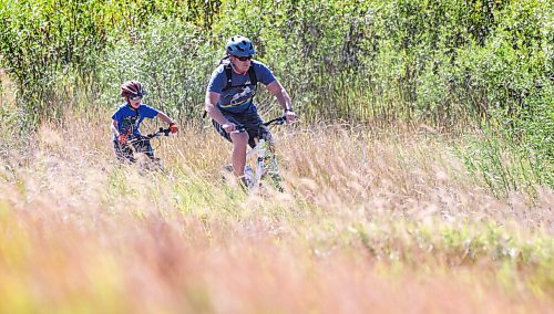 RUTH BONNEVILLE / WINNIPEG FREE PRESS

Local Standup 

Seven-year-old Matty enjoys trying to keep up with his dad Tyler as they mountain bike together at Bison Butte Friday afternoon.  The duo have been spending a lot of their free time at the hills after Matty got his new bike this year.  

No last name was provided when asked. 

Aug 13th, 2021
