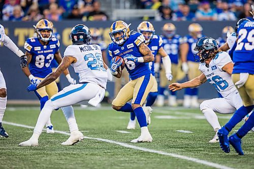 MIKAELA MACKENZIE / WINNIPEG FREE PRESS

Blue Bomber Charles Nelson runs with the ball as they face the Toronto Argonauts at IG Field in Winnipeg on Friday, Aug. 13, 2021. For --- story.
Winnipeg Free Press 2021.