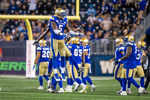 MIKAELA MACKENZIE / WINNIPEG FREE PRESS

Blue Bomber Willie Jefferson jumps in jubilation after winning against the Toronto Argonauts at IG Field in Winnipeg on Friday, Aug. 13, 2021. For --- story.
Winnipeg Free Press 2021.