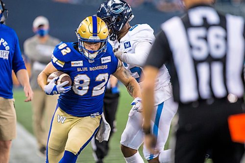 MIKAELA MACKENZIE / WINNIPEG FREE PRESS

Blue Bomber Drew Wolitarsky blasts past the Toronto Argonauts at IG Field in Winnipeg on Friday, Aug. 13, 2021. For --- story.
Winnipeg Free Press 2021.