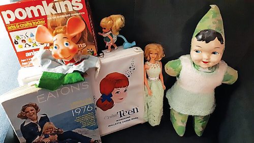 Canstar Community News Correspondent Suzanne Hunter took this photo of things that remind her of her childhood. On the right is the cloth doll she got at the Max Katz Dry Goods store.