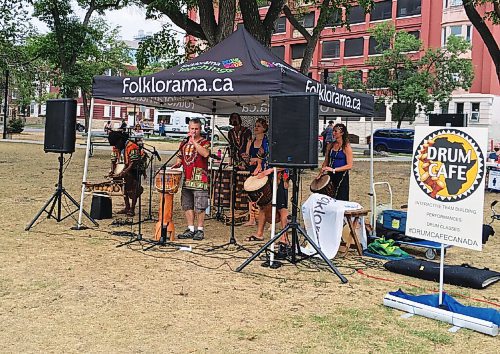 Canstar Community News Drum Cafe performed in Central Park on Aug. 5.