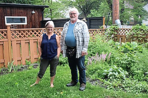 Canstar Community News Barbara Ediger (left) and Rod Kueneman says Riverview community gardeners are harvesting fewer vegetables than they did in previous years.