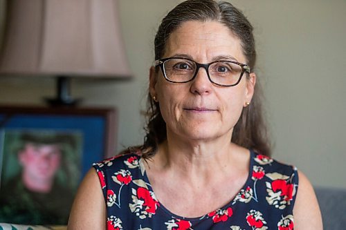 MIKAELA MACKENZIE / WINNIPEG FREE PRESS

Anita Cenerini, mother of Pte. Thomas Welch, poses for a portrait in her home in Winnipeg on Wednesday, Aug. 18, 2021. She has mixed feelings over the fall of Afghanistan to the Taliban. For Erik story.
Winnipeg Free Press 2021.