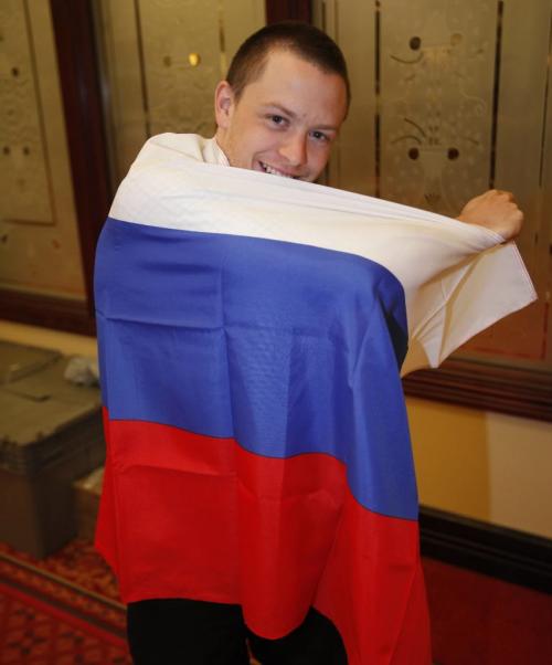 BORIS.MINKEVICH@FREEPRESS.MB.CA  100428 BORIS MINKEVICH / WINNIPEG FREE PRESS Jason "the Gunner" Gunnlaugson draped in a Russia flag.