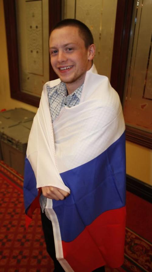 BORIS.MINKEVICH@FREEPRESS.MB.CA  100428 BORIS MINKEVICH / WINNIPEG FREE PRESS Jason "the Gunner" Gunnlaugson draped in a Russia flag.