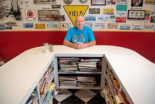 ALEX LUPUL / WINNIPEG FREE PRESS  

Rick Wareham, owner of Big Rick's Hot Rod Diner in Winnipeg, is photographed at one of the U-shaped tables on August 19, 2021. Rick is toasting the 35th anniversary of his homey diner this summer.

Reporter: Dave Sanderson
