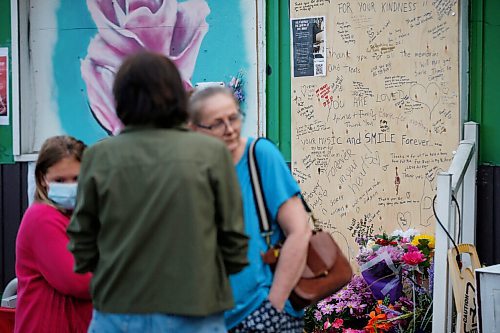 JOHN WOODS / WINNIPEG FREE PRESS
Sixty-five people gathered for a vigil and walk for Jung Ja Shin, the convenience store owner killed in an Osborne Village arson in Winnipeg Thursday, August 19, 2021.

Reporter: Pindera