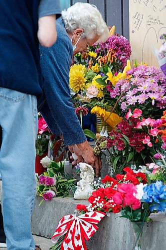 JOHN WOODS / WINNIPEG FREE PRESS
Sixty-five people gathered for a vigil and walk for Jung Ja Shin, the convenience store owner killed in an Osborne Village arson in Winnipeg Thursday, August 19, 2021.

Reporter: Pindera