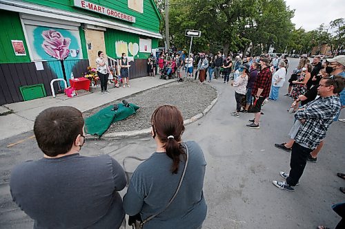 JOHN WOODS / WINNIPEG FREE PRESS
Sixty-five people gathered for a vigil and walk for Jung Ja Shin, the convenience store owner killed in an Osborne Village arson in Winnipeg Thursday, August 19, 2021.

Reporter: Pindera