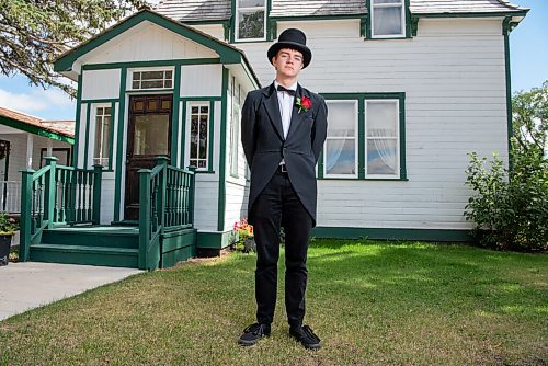 ALEX LUPUL / WINNIPEG FREE PRESS  

Tyler Johnson, an interpretive guide, is photographed in front of McClung House at The Nellie McClung Heritage Site in Manitou on August, 23, 2021. The I DO Exhibit celebrates the 125th wedding anniversary of Wes and Nellie McClung. Nellie McClung was a pioneer teacher, author, suffragist, social reformer, lecturer and legislator