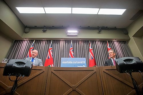 MIKAELA MACKENZIE / WINNIPEG FREE PRESS

Chief provincial public health officer Dr. Brent Roussin (left) and premier Brian Pallister speak at a press conference at the Manitoba Legislative Building in Winnipeg on Tuesday, Aug. 24, 2021. For --- story.
Winnipeg Free Press 2021.