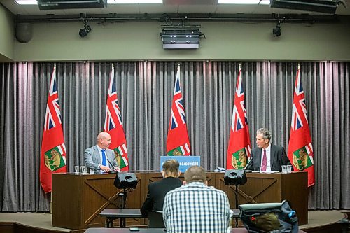 MIKAELA MACKENZIE / WINNIPEG FREE PRESS

Chief provincial public health officer Dr. Brent Roussin (left) and premier Brian Pallister speak at a press conference at the Manitoba Legislative Building in Winnipeg on Tuesday, Aug. 24, 2021. For --- story.
Winnipeg Free Press 2021.