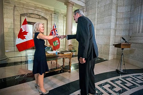 MIKAELA MACKENZIE / WINNIPEG FREE PRESS

Chief provincial nursing officer Lanette Siragusa (left) fist-bumps premier Brian Pallister after the Order of the Buffalo Hunt ceremony at the Manitoba Legislative Building in Winnipeg on Tuesday, Aug. 24, 2021. For --- story.
Winnipeg Free Press 2021.